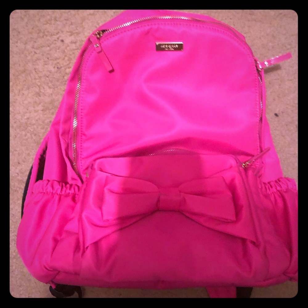 Kate Spade pink backpack with bow.